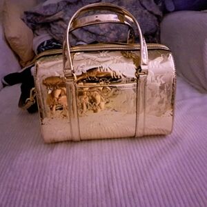 GOLD Michael Kors Jet Set Patent Logo Debossed Duffel Medium Crossbody Bag